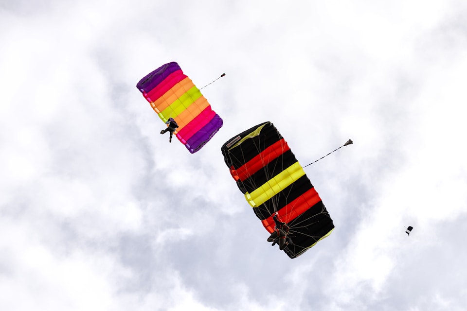 Dillon Teichroeb and Megan Rose return to terra firma during Skydive Salmon Arm's Mayhem Boogie event at Shuswap Regional Airport on May 17, 2025. 