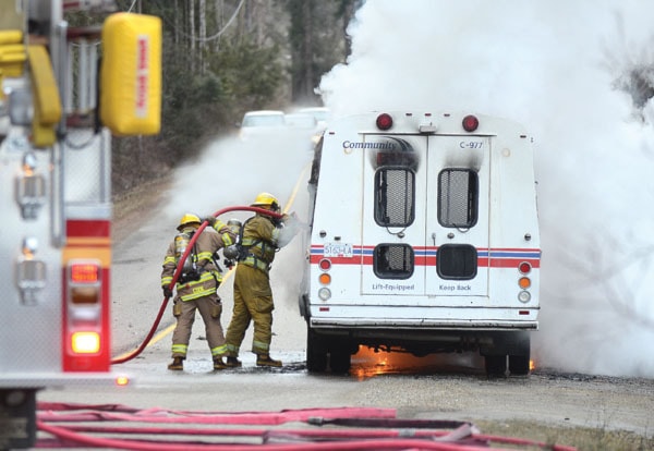 58148salmonarmJMShuswapTransitbusgoesupinflames20106col