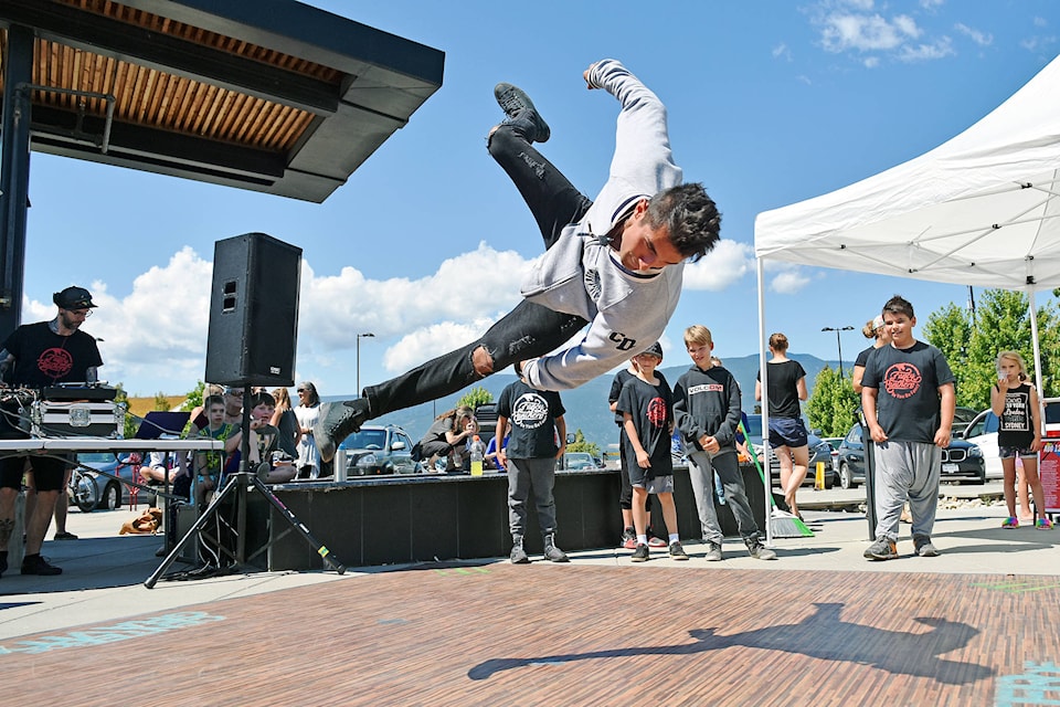 Dancer Rikki Carmen spins in the air during a breakdance demonstration hosted by Salmon Arm’s Fancy Panthers at Uptown Askew’s on Monday, July 23. (Lachlan Labere/Salmon Arm Observer)