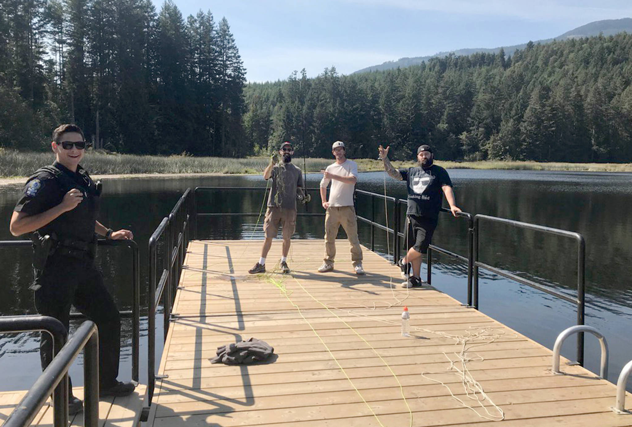 Chair, knives and bottle caps: 3 anglers clean up B.C. lake by
