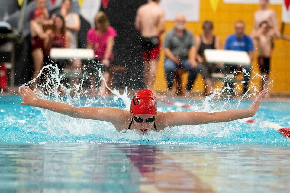 Abby Bushell does the butterfly stroke at the Fun Meet on Friday, May 24. (Brad Calkins)