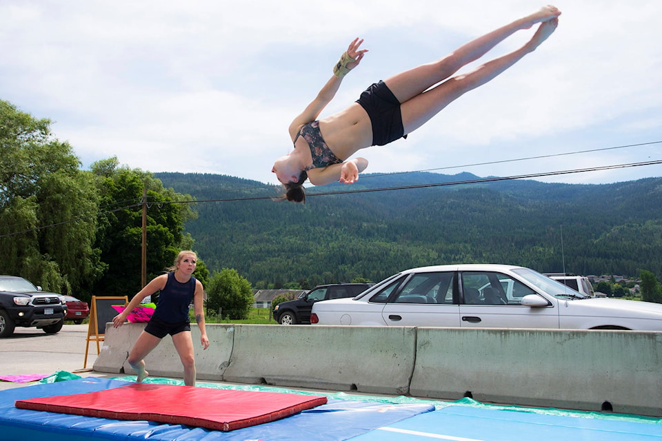 Taylor Bowden reaches impressive heights as coach Elise Vanderhoek stands ready to spot her on Sunday, June 2. (Jim Elliot/Salmon Arm Observer)