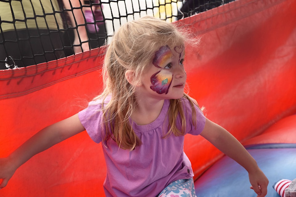 Elizabeth Mclean in the bouncy castle during the Uptown Askew’s Family Day event Saturday, June 20. (Cameron Thomson/Salmon Arm Observer)