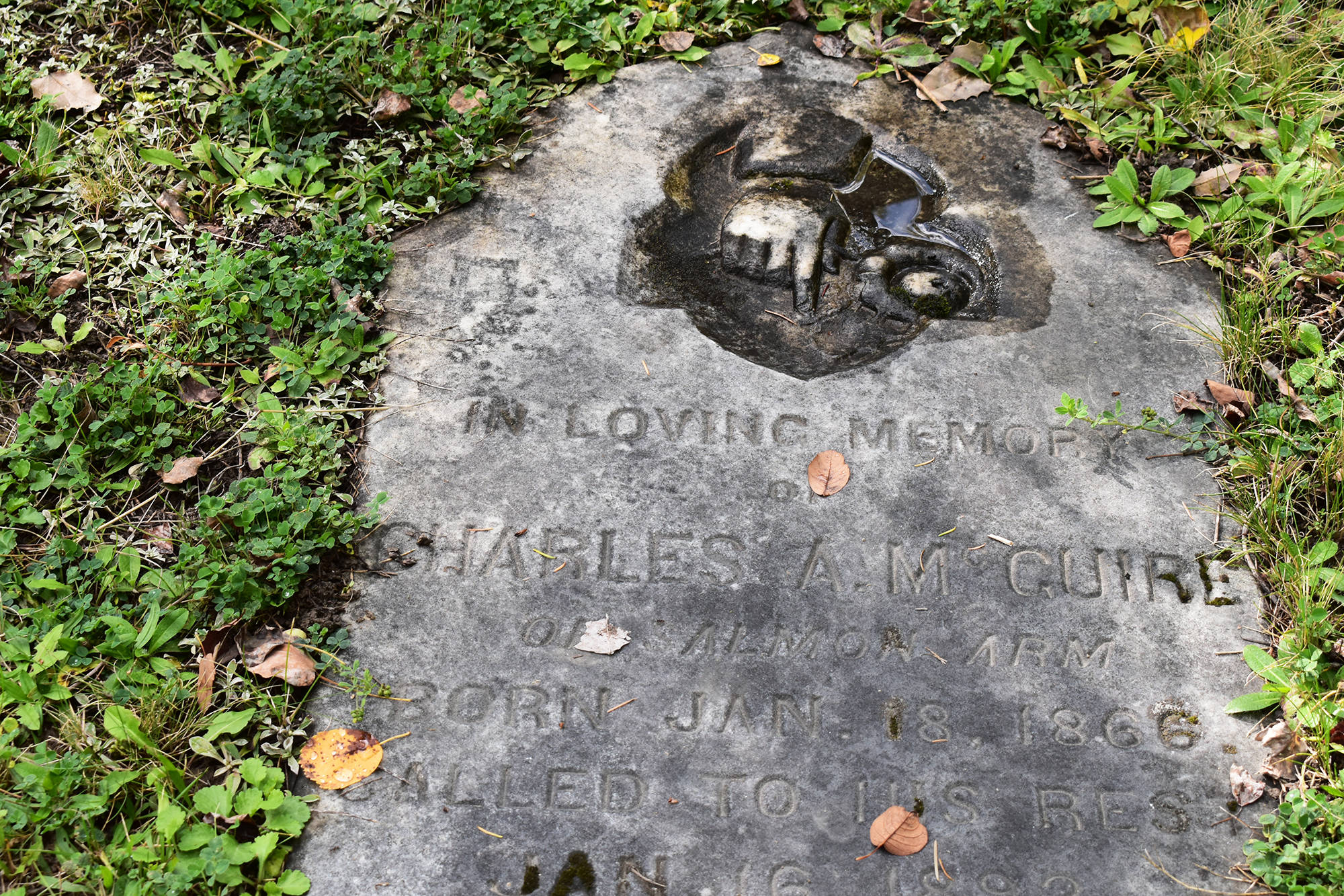 Whose grave is marked by the oldest tombstone in Salmon Arm’s Mount Ida