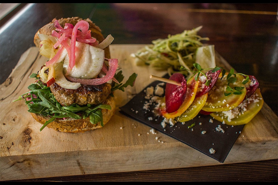 The Craft Bierhaus’ “Lamb Burg-hini”. It had a lamb patty with fennel, pickled onions and beetroot aioli on a pretzel bun served with a chimichurri slaw and beetroot carpaccio. It was like an edible painting on a plate. (Liam Harrap/Revelstoke Review)