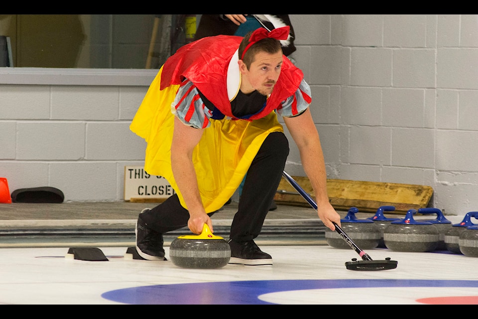 Nathan Murphy was the Snow White to the rest of his team’s seven dwarves at the Curl for Cancer event held at the Salmon Arm Curling Centre on Sunday, Nov. 3. (Jim Elliot/Salmon Arm Observer)