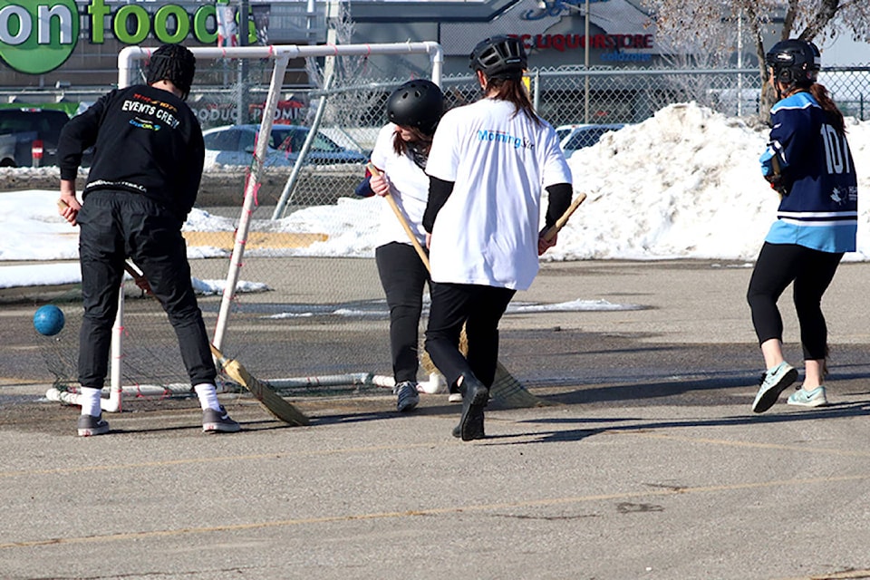 Aryana Jacura of the Beach Radio Bums (right) scores her first of two goals against Morning Star Sweepers rookie netminder Caitlin Clow with Beach teammate Ethan Schiman (left) avoiding the check of Star defenceman Paris Beaudry for a possible rebound during the Vernon Winter Carnival Broomball Tournament Wednesday, Feb. 12, at the Village Green Hotel. The radio guys scored a stunning 3-1 upset over the Stars to advance to Friday’s championship game at 1:15 p.m. at the Green against either the defending champion City of Vernon Yard Workers or the Davidson Lawyers. (Roger Knox - Morning Star)
