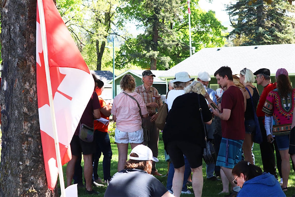 Protesters in Vernon’s Polson Park voiced their opposition to shutdowns related to the COVID-19 pandemic and more on Saturday, May 9, 2020. (Brendan Shykora - Morning Star)