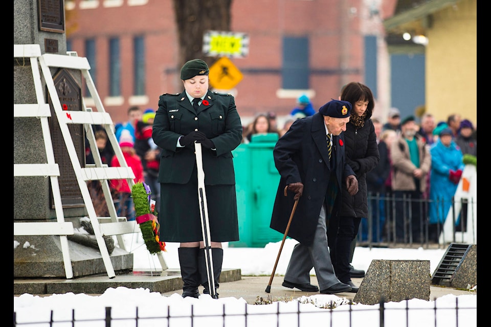 Second World War veteran John Augustyn and his daughter Christine Brown laid the first wreath on behalf of MP Wayne Stetski and Canada during the Remembrance Day ceremony in 2017. (Marissa Tiel - Revelstoke Review)