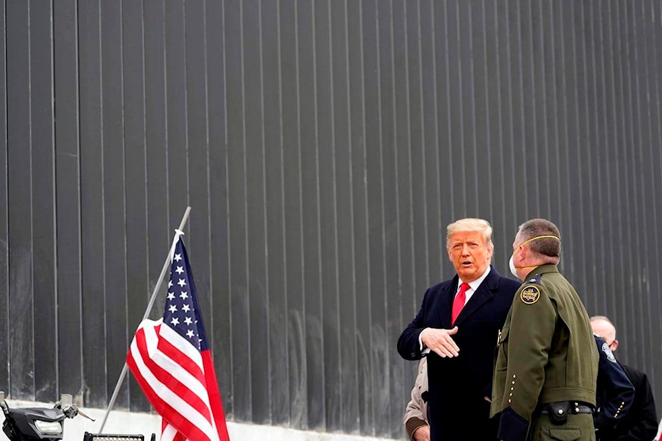 President Donald Trump tours a section of the U.S.-Mexico border wall under construction Tuesday, Jan. 12, 2021, in Alamo, Texas. (AP Photo/Alex Brandon)