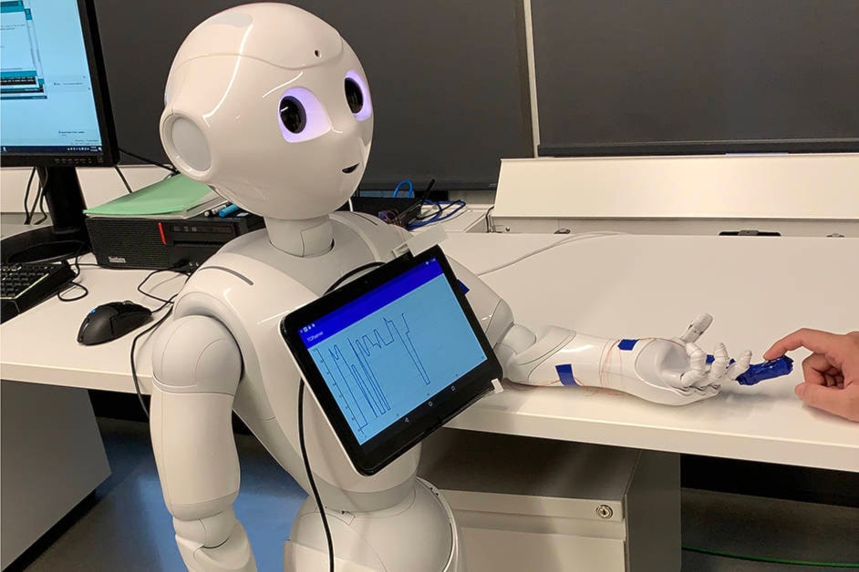 The humanoid sensing robot has a 3D printed finger cap that measures oxygen levels. (Dr. Woo Soo Kim)