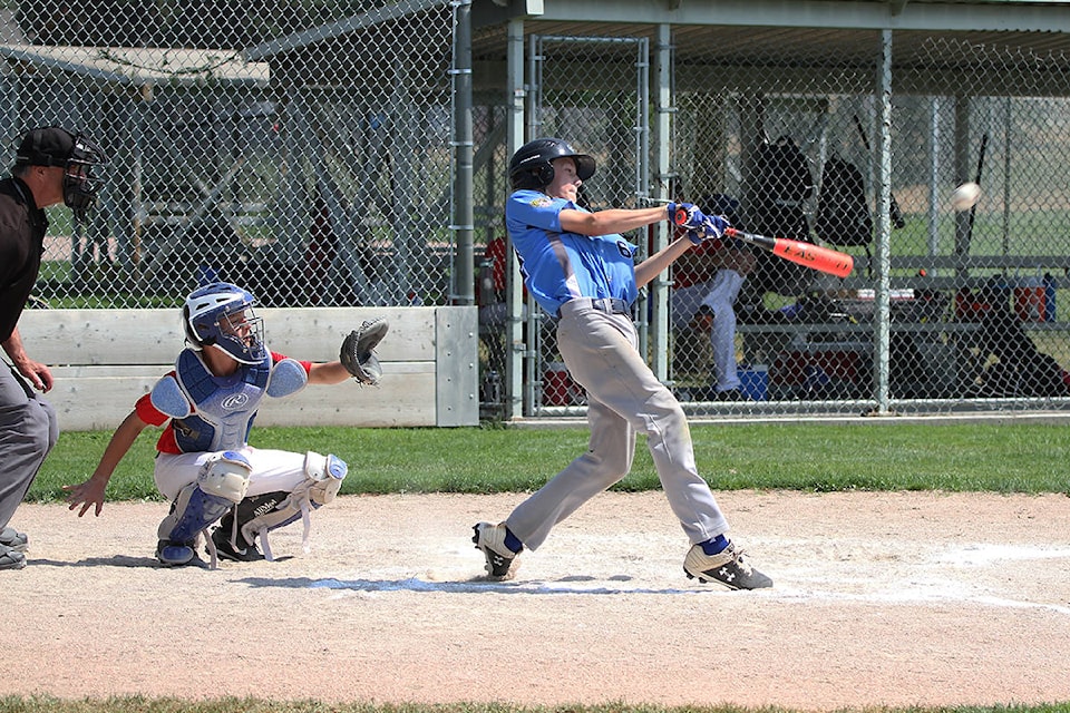 Salmon Arm 13U AA player Brendan Hughes hits a home run in Kelowna. (Rebecca Scott Photography)