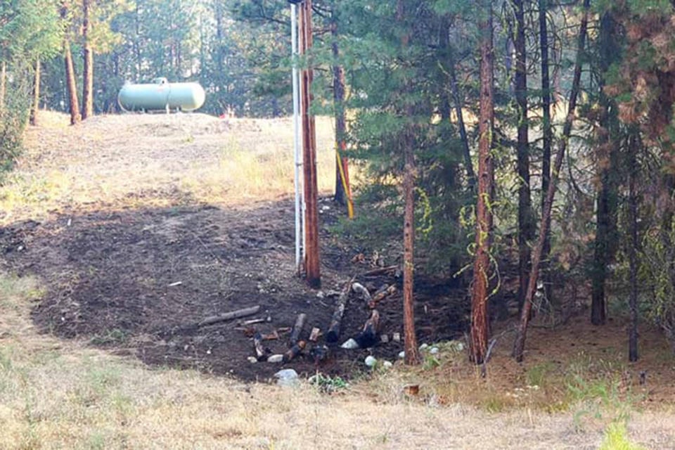 A Fortis power pole sparked on a property on Anarchist Mountain starting a grass fire last week. Just one of the many unexpected challenges firefighters are facing. (Facebook)