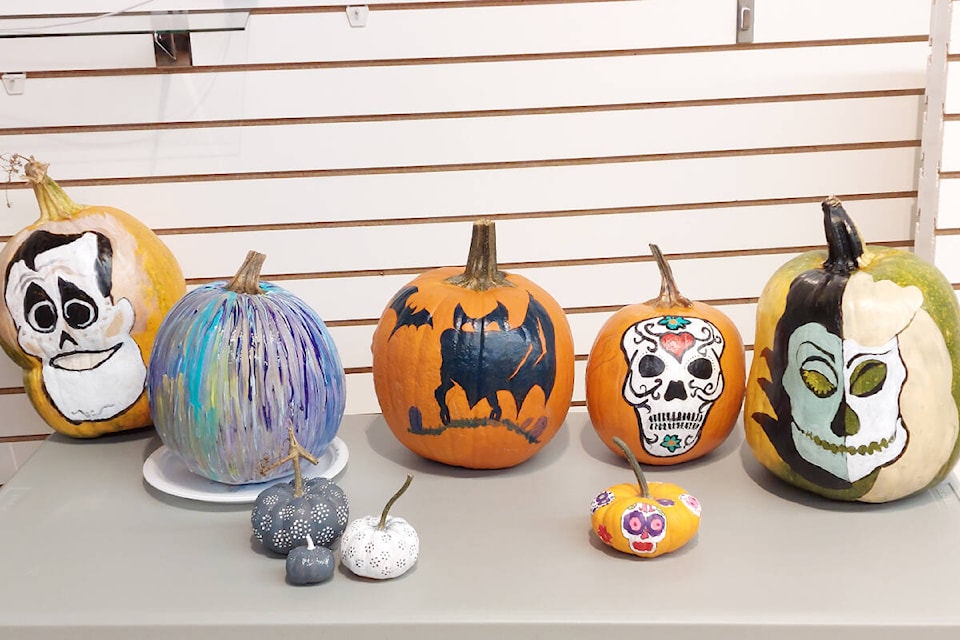 A collection of pumpkins which were painted by members of the Evening Art Group. (Diana Blake photo)