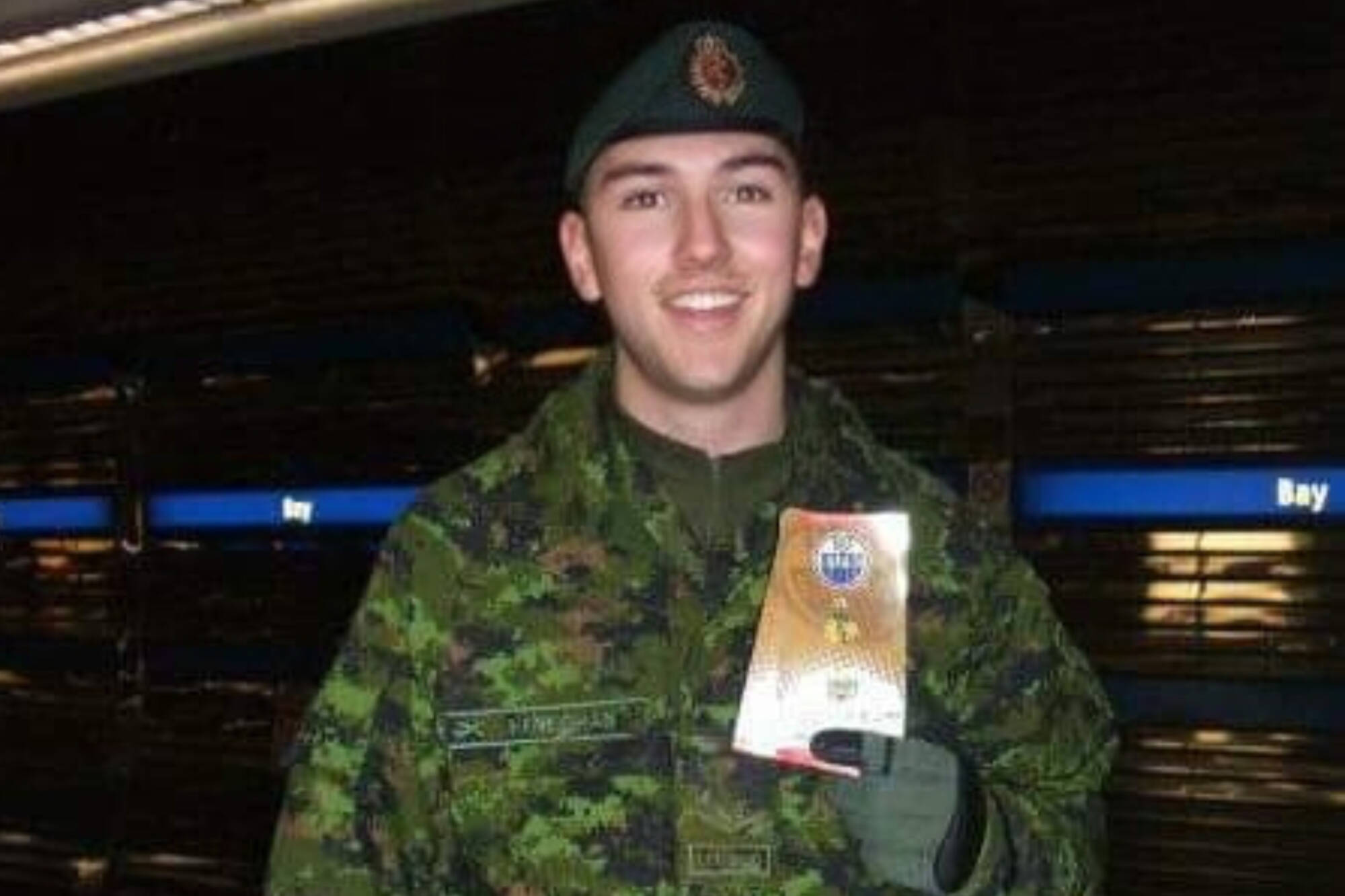 Matthew Heneghan and Pte. Colin Wilmot enjoyed watching hockey and cheering on the Oilers together. (Contributed)