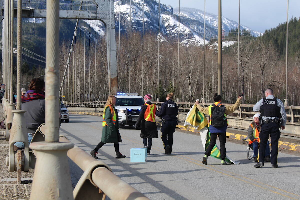 A Save Old Growth protester being arrested by RCMP on April 9. (Josh Piercey/Revelstoke Review)