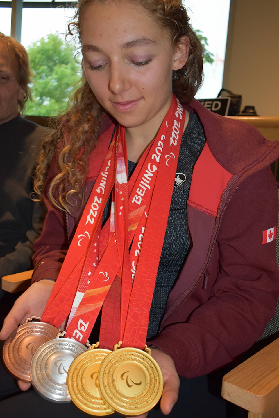 29234435_web1_220601-SAA-Natalie-holding-medals