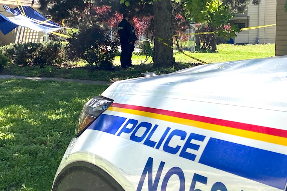 Investigations into a shooting at an Okanagan Landing townhouse complex continued Monday, June 6, three days after a man was killed. (Jennifer Smith - Morning Star)