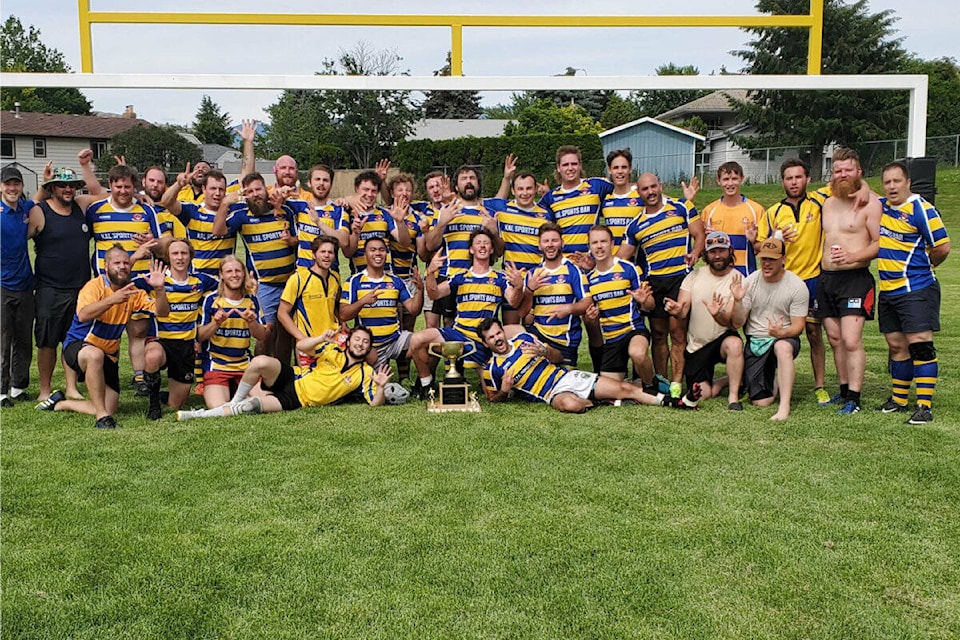 The Vernon Jackals celebrate their latest Okanagan Rugby Union championships, a 44-5 romp over the Salmon Arm Yeti in the playoff championship Saturday, July 9, at Grahame Park in Vernon. (Roger Knox - Black Press)