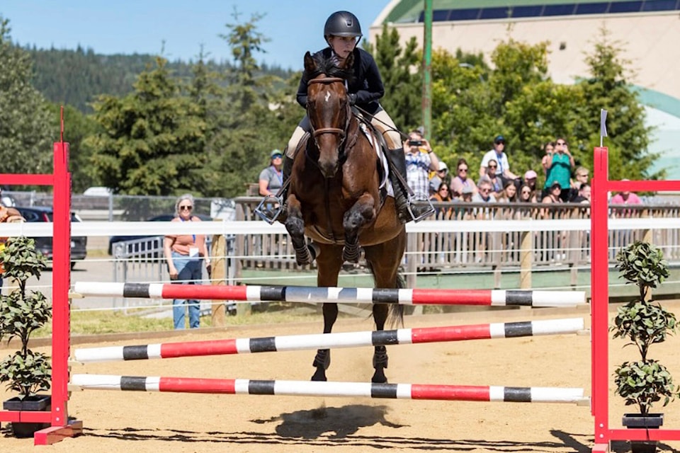 Katie Thielman from Salmon Arm competes in show jumping in the BC Summer Games in Prince George in July 2022 on her horse Marquetry Rose where she won four gold medals. She’s heading to New Zealand in January 2023 on the Canadian Pony Club team for the International Pacific Exchange. (BC Summer Games photo)