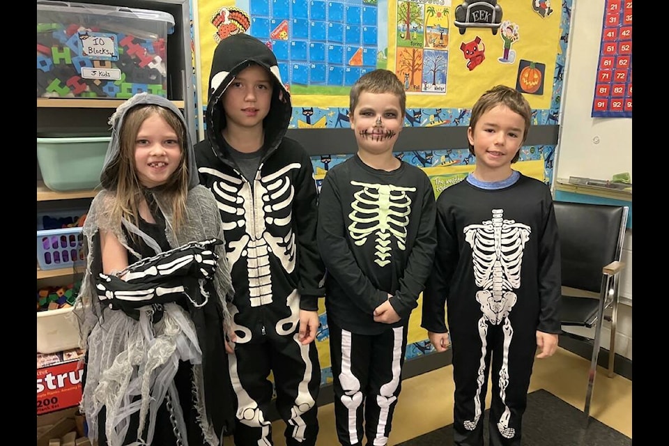 Skeleton crew Kennedy Sanche, Gunnar Millar, Oakley Lee and Dieken Green pose for a photo on Halloween day at Parkview Elementary. (Contributed).