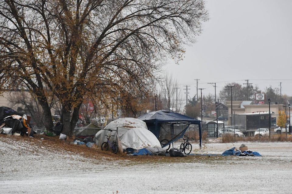30924456_web1_221109-SAA-homeless-tents