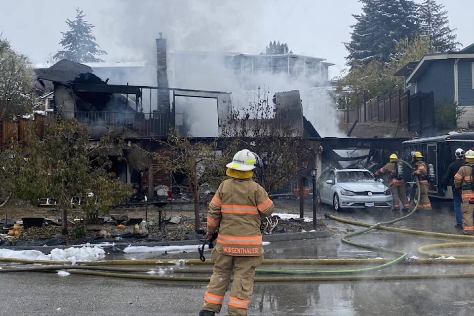 Coldstream Fire Department crews, with help from neighbouring Lavington Fire Department members, extinguished a fire at a home on Cherry Lane Sunday, Nov. 6. (Dave Pimson photo)