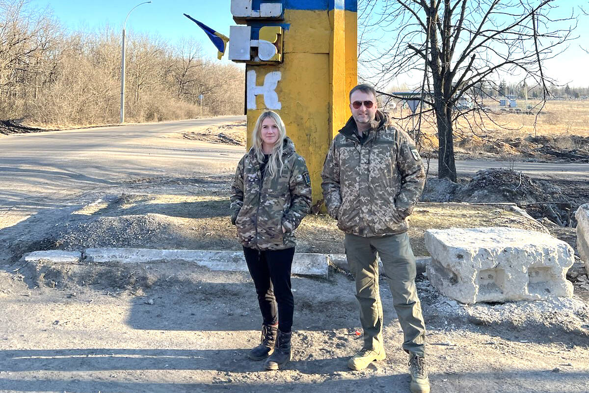 Castlegar resident April Huggett (left) stands with Kyle Parker, chief of staff of the Helsinki Commission, in Ukraine. Photo: Submitted