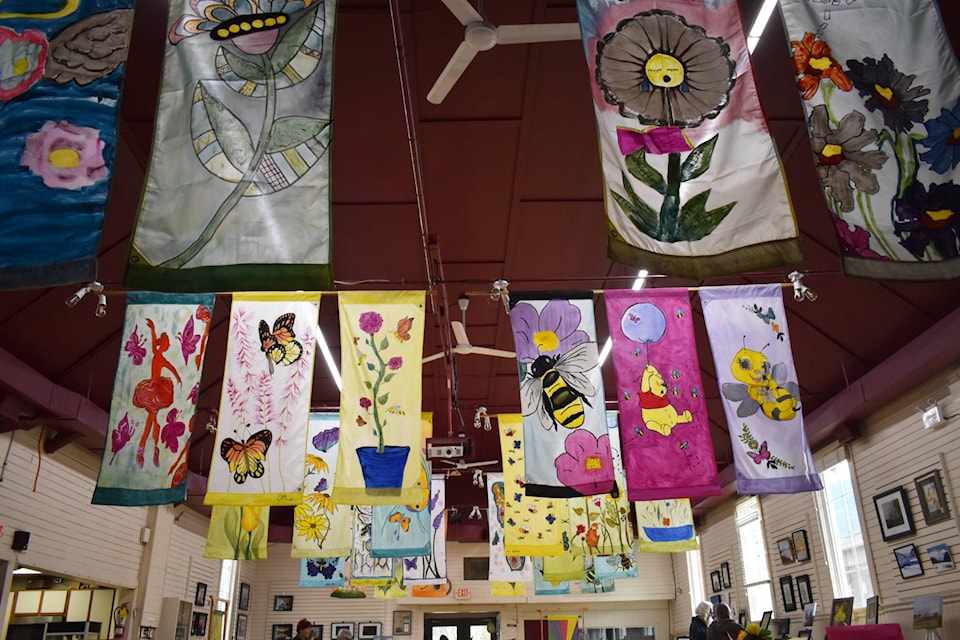 The Sicamous Community Banner Project’s 2023 designs hang from the Red Barn’s ceiling Saturday and Sunday, March 25 and 26. (Rebecca Willson/ Eagle Valley News)