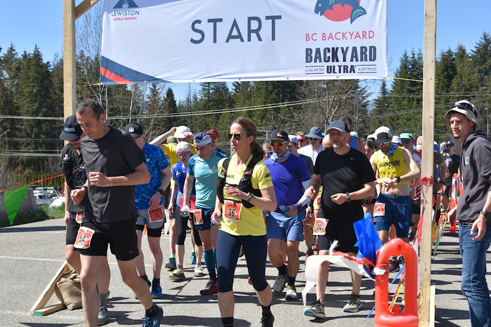 About 60 BC Backyard Ultra runners head out from the Little Mountain fields on lap 5 about midday on Friday, April 28, under sunny skies with a 27 C temperature. (Martha Wickett/Salmon Arm Observer)