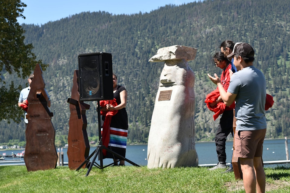 On May 13 in Chase Memorial Park, the Tsqúqw7e Landmark sculpture, meaning ‘small bay,’ is unveiled and its sculptors recognized, particularly Mike ‘Savage’ Peters, who died prior to its completion. (Martha Wickett/Salmon Arm Observer)