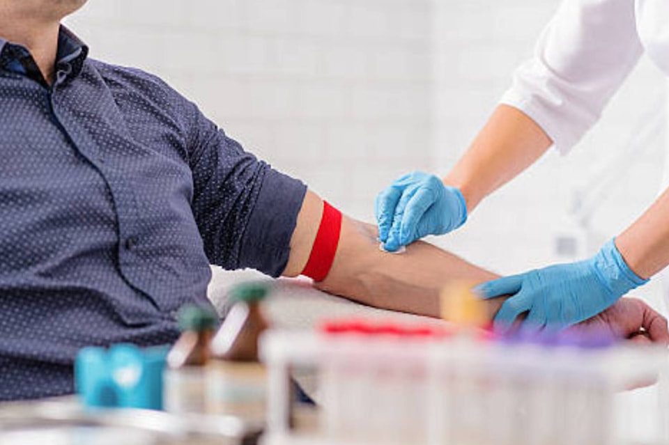 32867746_web1_taking-blood-photo