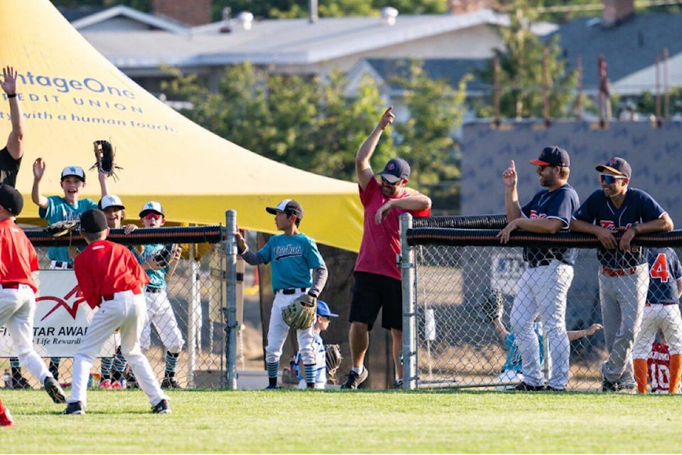 Teams celebrate during play at the T2 AAA U11 baseball provincial championship hosted in Vernon. (Kristal Burgess Photography)
