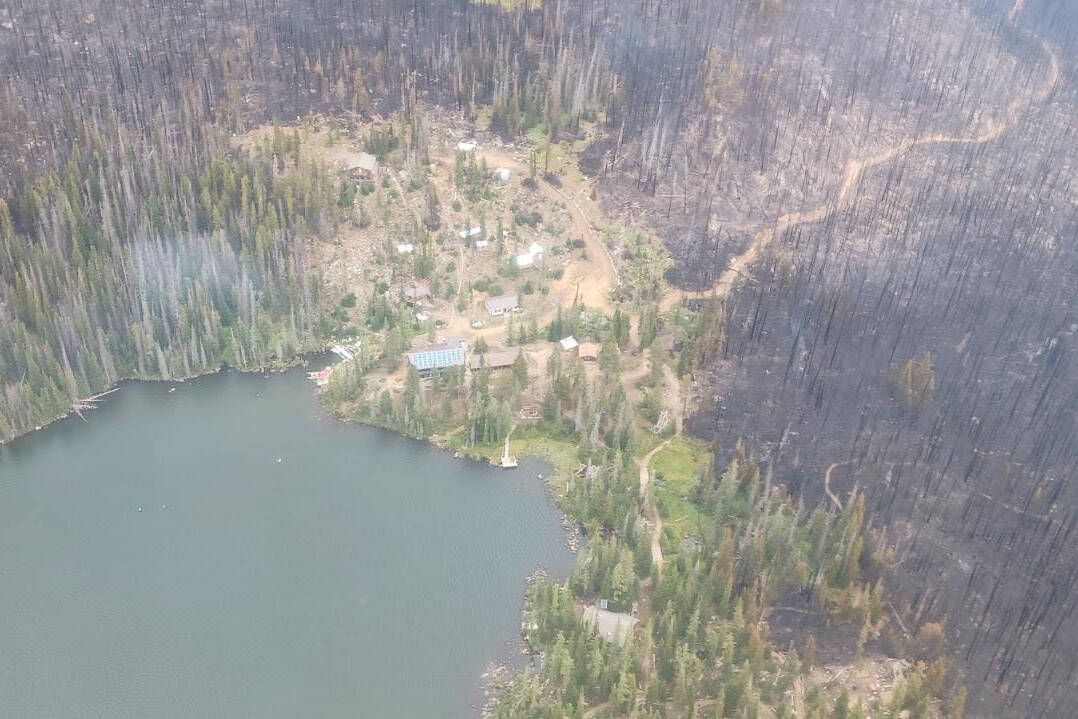 This picture shows just how close the Crater Creek wildfire came to burning the Cathedral Lakes Lodge. (Cathedral Lake Lodge - Facebook)