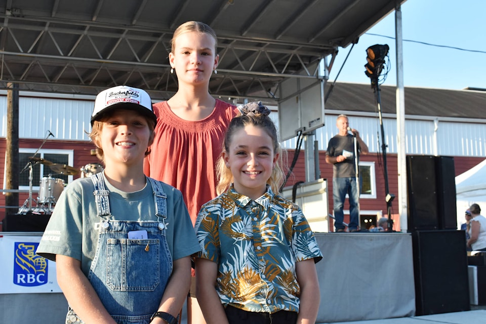 First place winner of the Project Grow Youth competition, Madison Schubert, stands behind second place winner Finn Albisser and third place’s Jasmine Stiles Friday, Sept. 8, 2023 at the Salmon Arm Fair. (Rebecca Willson-Salmon Arm Observer)