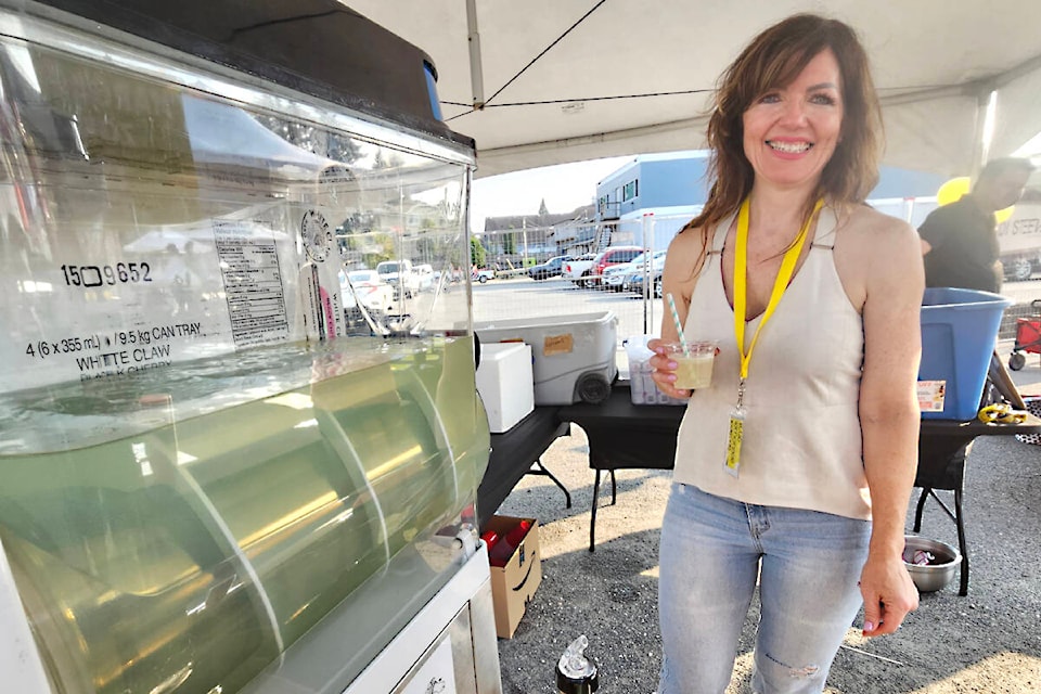 Aldergrove Business Association president Jodi Steeves said despite a technical glitch that prevented people from tapping to donate, the first-ever Alder Groove and Grub event raised close to $2,000 for charity on Saturday, Aug. 26. (Dan Ferguson/Langley Advance Times) 