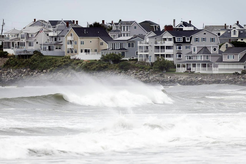 Waves come ashore, Saturday, Sept. 15, 2023, in Hampton Beach, N.H. Severe conditions were predicted across parts of New England and hurricane conditions could hit the Canadian provinces of New Brunswick and Nova Scotia, where the storm, Lee, downgraded early Saturday from hurricane to post-tropical cyclone, was expected to make landfall later in the day.(AP Photo/Michael Dwyer) 