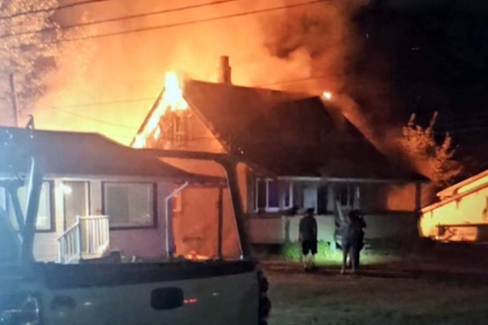 A fire destroyed an unoccupied house near the intersection of 248th Street and Fraser Highway early Sunday morning, Sept 3. (Barb Solvey/Special to 91ԭ Advance Times) 