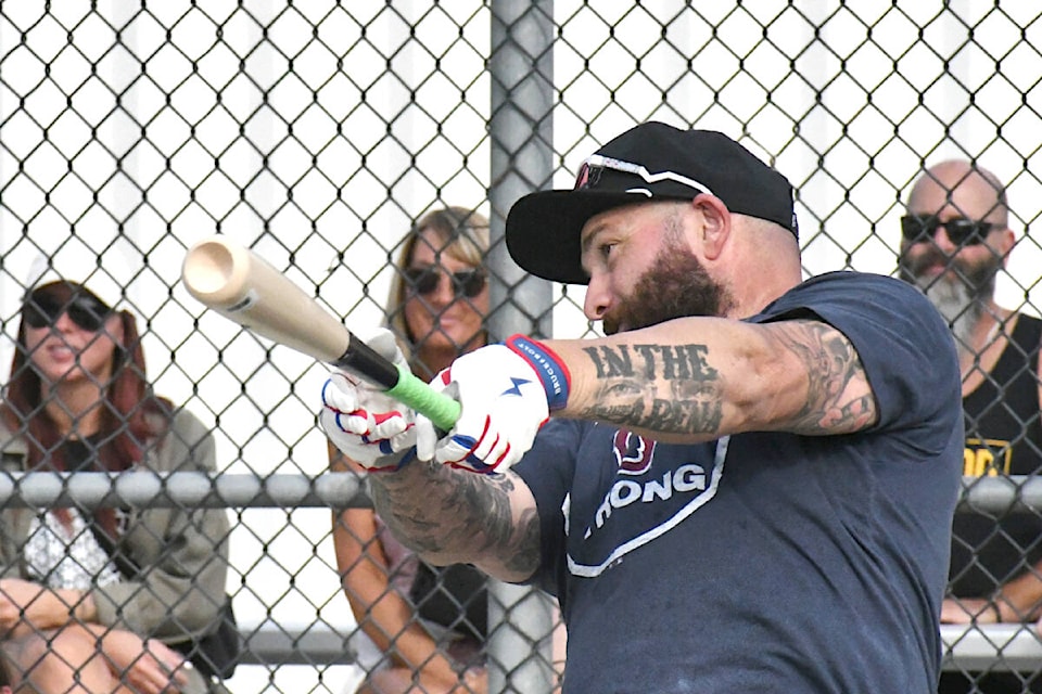 MLB Slugger and two-time World Series champion Jonny Gomez hammered a shot deep into the field during the ‘Pros versus Joes’ home run derby on Sunday, Sept. 11 at McLeod Athletic Park in 91ԭ. It was part of an event to rise awareness about mental health issues. (Dan Ferguson/91ԭ Advance Times) 