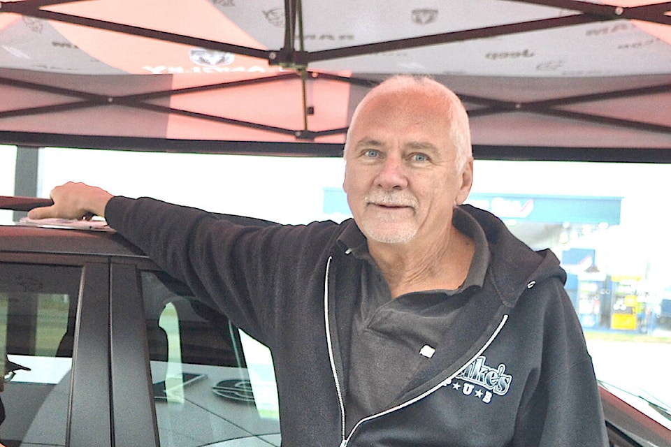 Harley Haugen from Chilliwack was one of three finalists in a contest to win a Jeep Cherokee Altitude from 91ԭ Chrysler by keeping hands on the vehicle the longest, winning when his name was drawn during the 91ԭ Good Times Cruise-In. on Saturday, Sept. 9. (Kyler Emerson/91ԭ Advance Times) 