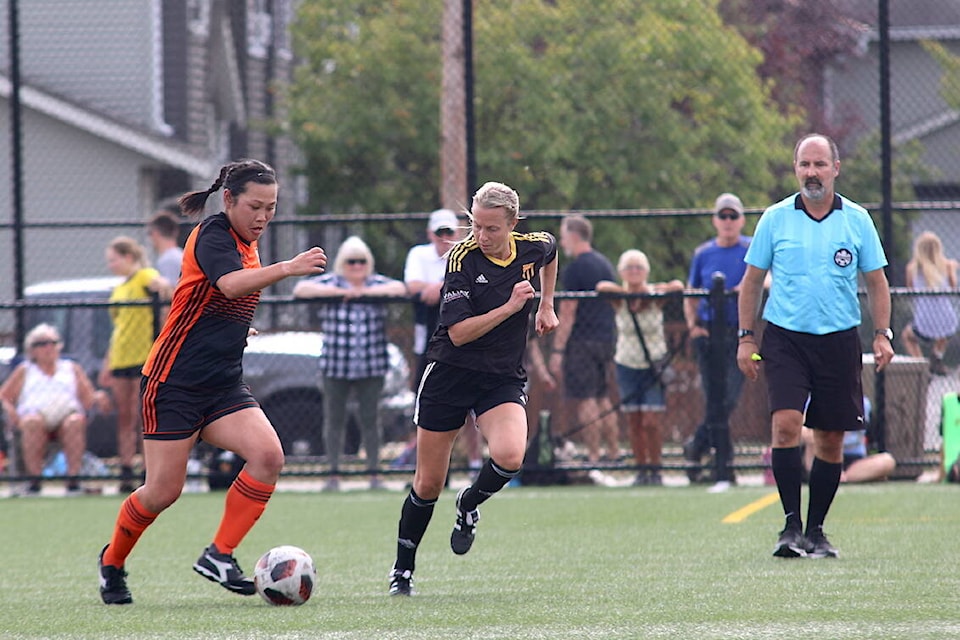 Cowichan’s Monni Savory cuts off a Prospect Lake player prior to scoring her team’s first goal of the season during first half action of the Cougars’ opening weekend loss to the Lakers. (Sarah Simpson/Citizen) 