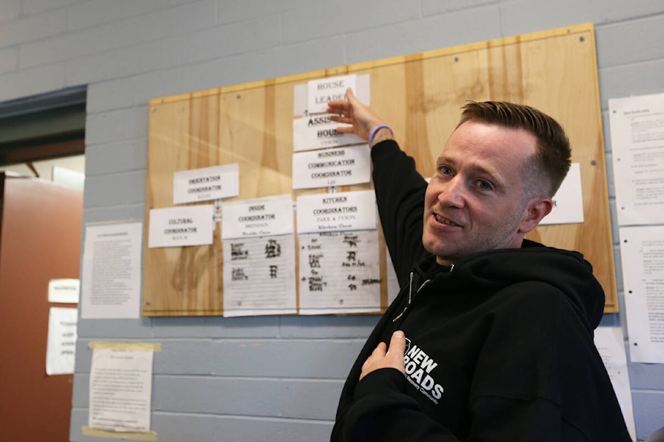 Joshua Ritch proudly shows off his position as house leader, earned through his success in the New Roads Therapeutic Recovery Community program and his dedication to supporting his fellow residents, during a media tour of the View Royal facility Thursday (Sept. 14). (Justin Samanski-Langille/News Staff) 