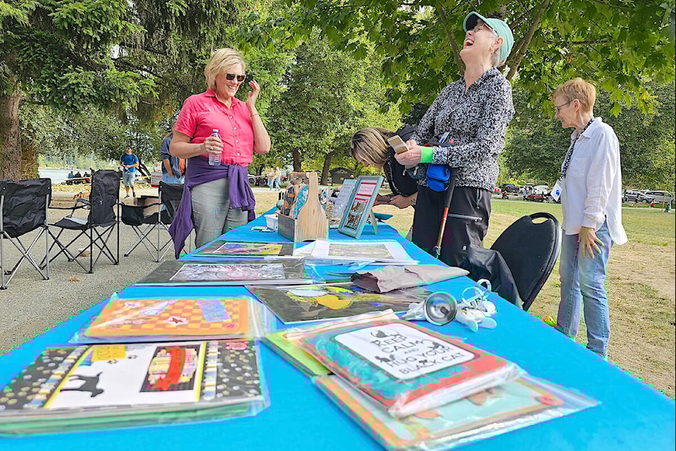 More than 60 people took part in the 20th annual CARES walk for cats fundraiser at Derby Reach Park on Sunday, Sept. 17. Participants in the five-kilometre walk enjoyed a complimentary barbecue. There were bargains and giveaways, including gift cards to various grocery stores, cat care books, and food. (Dan Ferguson/91ԭ Advance Times) 