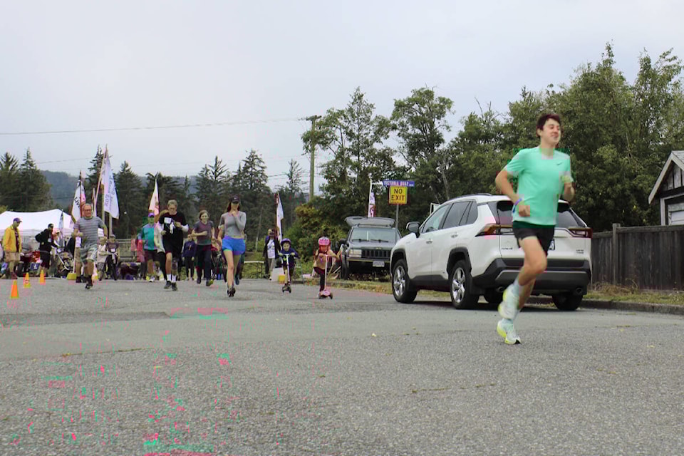 Karson Karaim started out ahead and was also the first to finish the 5-km run. (SONJA DRINKWATER / Special to the AV News) 