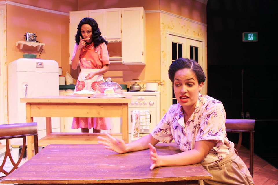 An animated Rose (Rebbekah Ogden) addresses concerns to cake-making Lucy (Jasmine Case) in The Fiancee. (Photo by Don Bodger) 