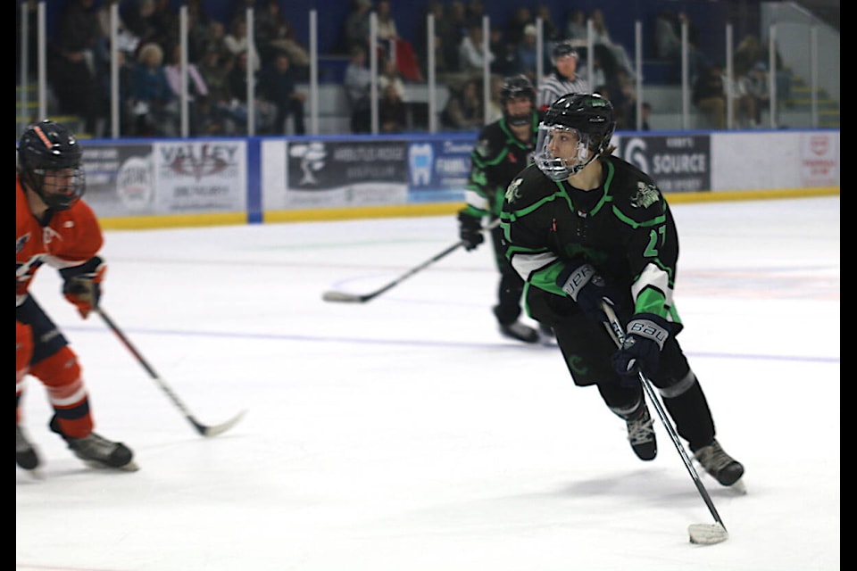 Lake Cowichan rookie forward Ryan Cooper looks for an opening to shoot during play against the Kerry Park Islanders Saturday night at Kerry Park Arena. (Sarah Simpson/Gazette) 