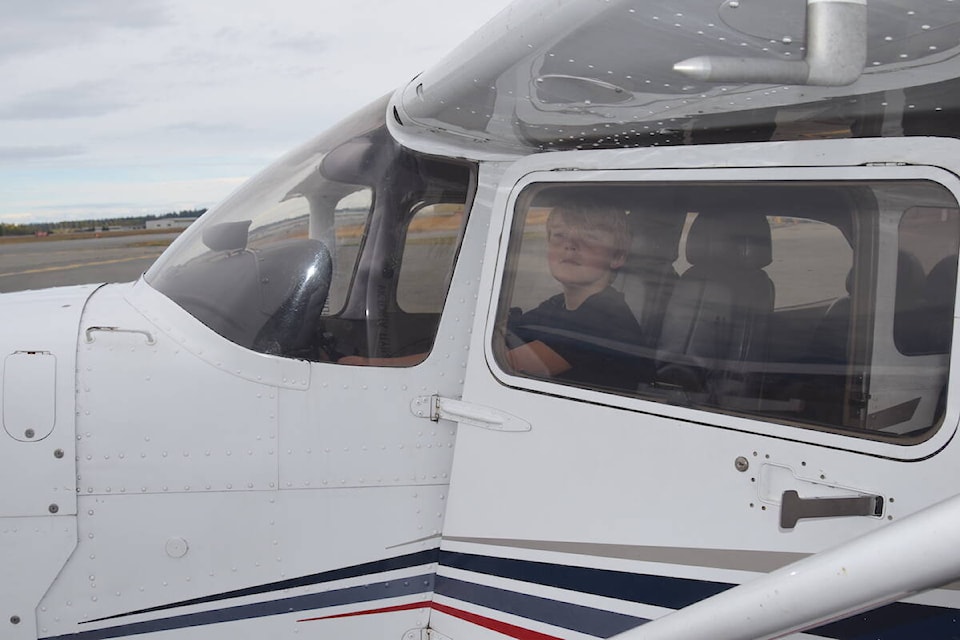 Grayson Rempel sits in a Cessna 172 during the Victoria Flying Club’s open house Sunday (Sept. 24). (Brendan Mayer/News Staff) 