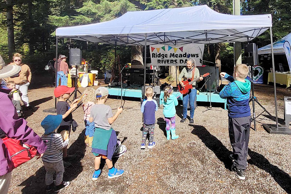 Lisa Rae Simons performs for the children at Ridge Meadows Rivers Day, a celebration at Allco Park in Maple Ridge. (Sophie Sparrow/ Special to The News) 