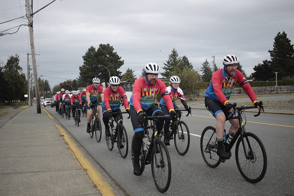 Tour de Rock riders cruise down Dogwood Street on Sept. 26. Photo by Marc Kitteringham/Campbell River Mirror 