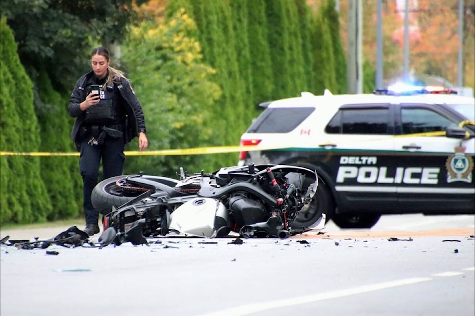 Delta police are looking for witnesses to a serious crash involving a grey motorcycle and a white sedan that occurred at 80th Avenue and 113B Street shortly before 3:45 p.m. on Sept. 24, 2023. (Shane MacKichan photo) 
